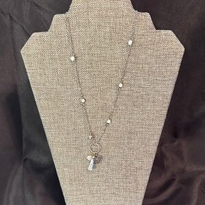 Elegant Silver Necklace with Charms